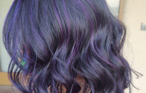 Shoulder-length waves in deep violet with lighter violet tones