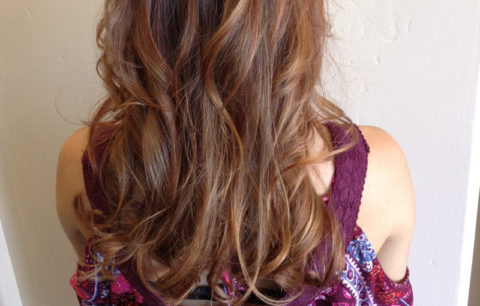 Long warm brown curls, back view