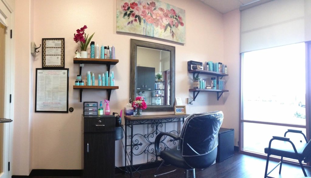 Styling station and mirror inside Gray’s Hair Studio in Vista, California